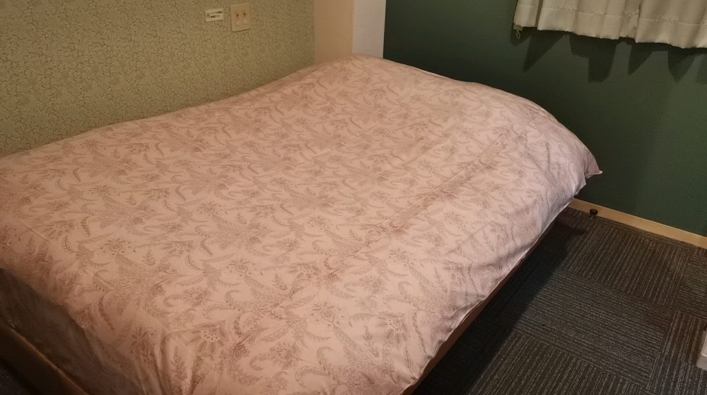 大塚タウンホテルのベッド